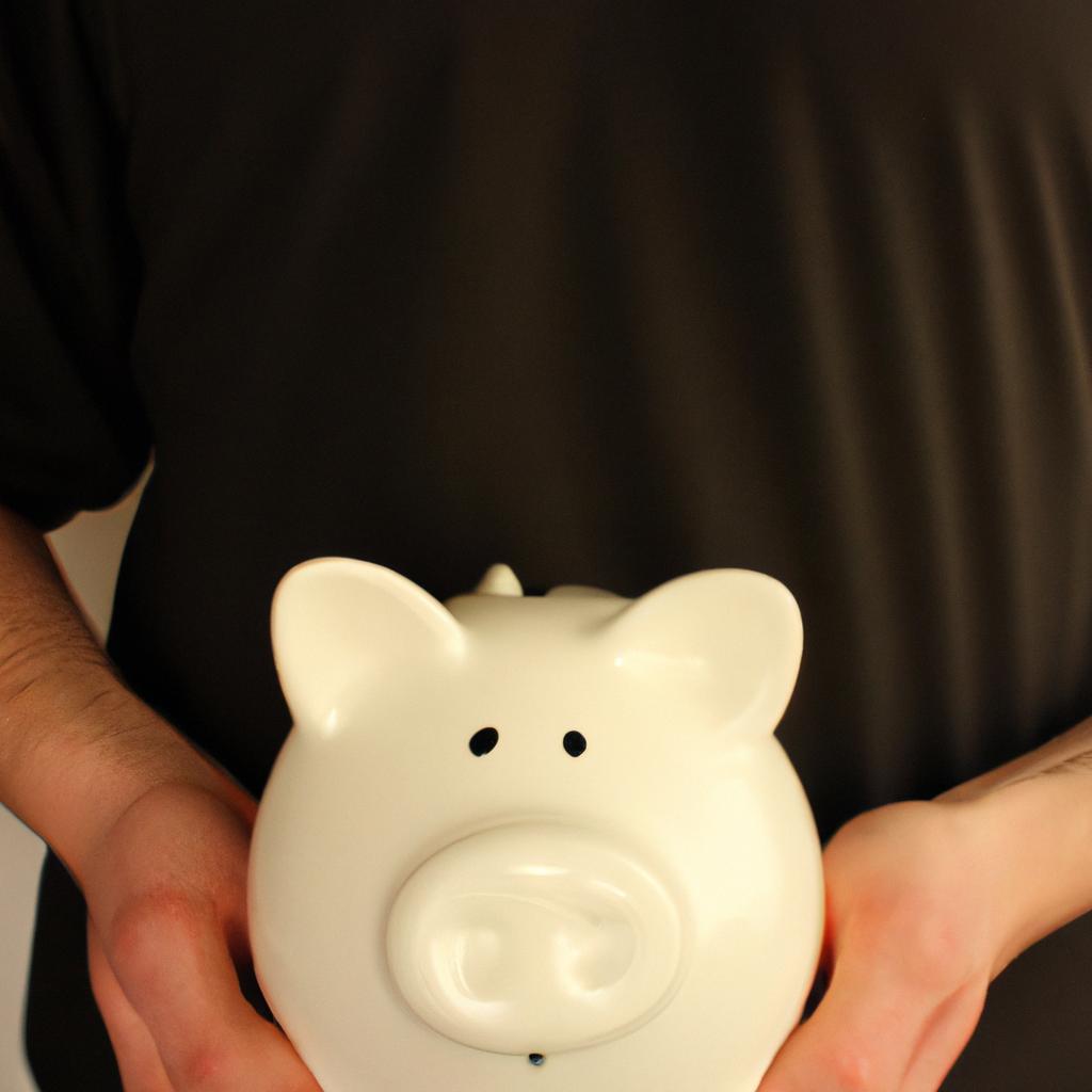Person holding piggy bank